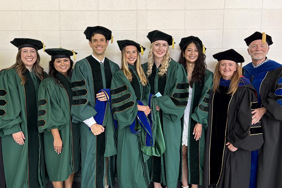Baylor PhD graduates in School Psychology pictured at commencement with faculty advisors